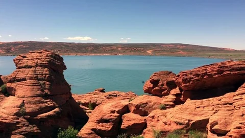 Scenic view of a lake surrounded by red rocks HD Stock Footage 74101719