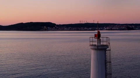 Scenic View Lighthouse During Sunset in Coast Stock Footage 295935043