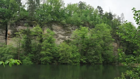 Scenic view of limestone cliffs above pond in Bohemian Paradise, Czech Republic Stock-Footage 337701305