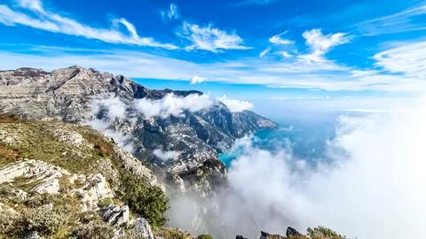 Scenic view from Monte Comune on cloud covered peaks Monte Molare, Canino, .. Stock Photos