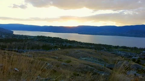 Scenic view of a mountain landscape at sunset Stock Footage 60964998