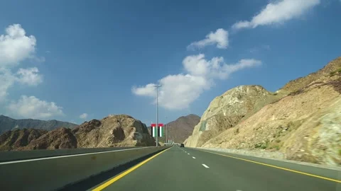 Scenic View of Mountain Road Infrastructure in Sharjah Stock Footage 258659842
