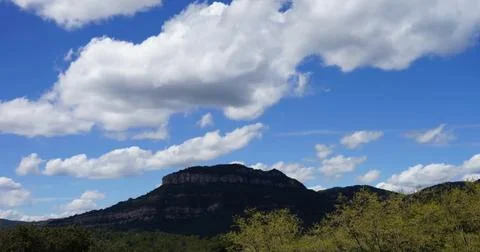 Scenic View of Mountains Under a Clear Sky Stock Photos