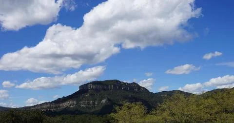 Scenic View of Mountains Under a Clear Sky Stock Photos