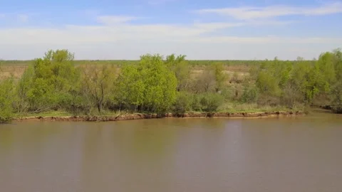 Scenic view of the muddy Parana River in Argentina flowing Stock Footage 345941041