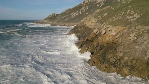 Scenic View Of Ocean Waves Breaking On The Cliffs Stock Footage 252831146