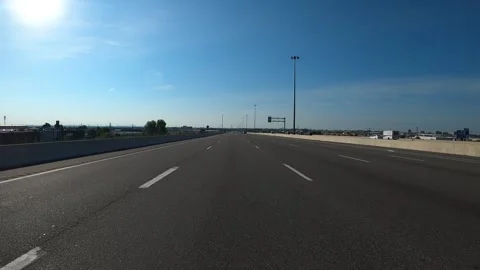 Scenic view of an open road with minimal traffic and clear skies. Stock Footage 316302202