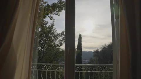 Scenic view from open window revealing a beautiful landscape Stock Footage 339097989