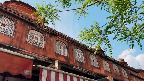 Scenic View of Ornate Architectural Structure Against Clear Blue Sky with Lush G Stock Footage 336602806