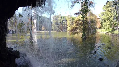 Scenic View Out Of Cave To Waterfall Lake In Buen Retiro Park Madrid Slow Motion Stock Footage 86976622