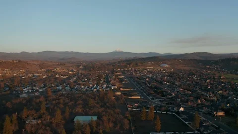 Scenic View Over the City while Backing Away From Majestic Mountains in Oregon Stock Footage 121227959