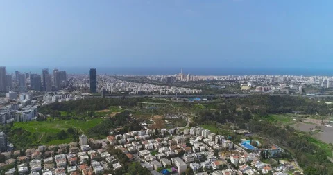 Scenic view over Tel Aviv green skyline, High rise drone from residential houses Stock Footage 127358295
