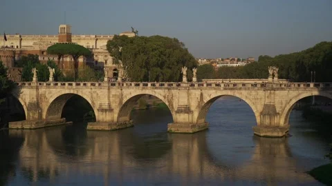 Scenic view of Ponte SantAngelo crossing the Tiber River in Rome, Italy, with Stock-Footage 325743979