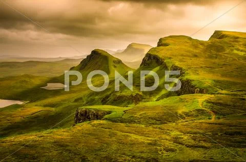Scenic view of quiraing mountains sunset with dramatic sky, scotland Stock Photos