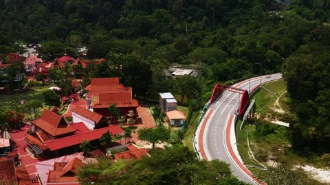 Scenic view of the Red Bridge and the Eastern village of Oriental Village on Stock Footage 320490093