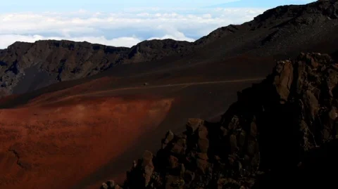 Scenic view of a remote volcanic landscape with billowing clouds in the Video stock 88342885