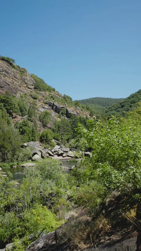 Scenic view of a river flowing through a rocky landscape Video stock 295063566