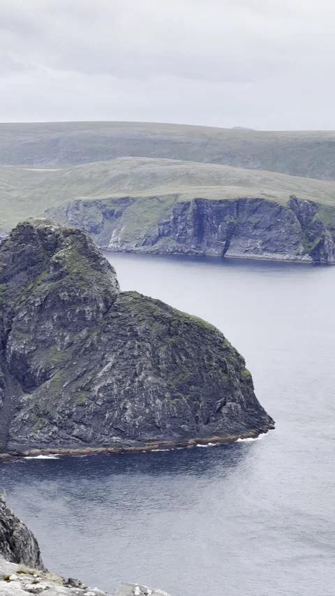 Scenic view of rocky cliffs and the Arctic Ocean at Nordkapp. Stock Footage 340332076