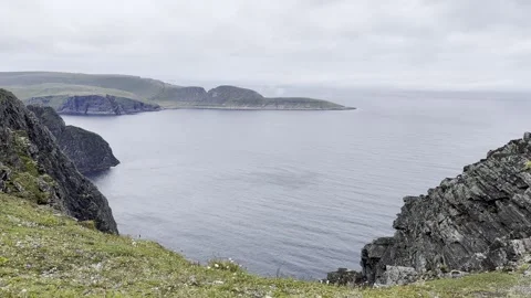 Scenic view of rocky cliffs and the Arctic Ocean at Nordkapp. Stock Footage 340332105