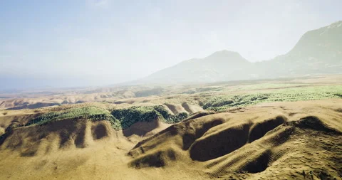 Scenic view of rolling hills and valleys under clear sky at dawn Vídeos de archivo 321494553