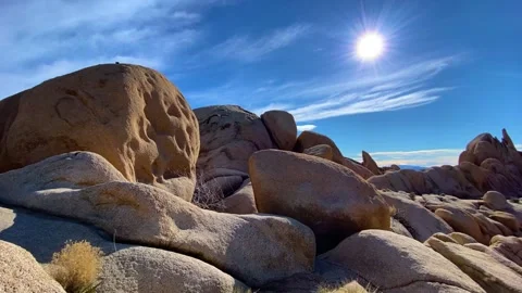 Scenic View of Rounded Sandstone Rocks and Desert Plants in Joshua Tree Park Stock-Footage 329579360