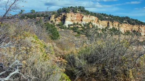 Scenic View of Rugged Cliffs and Desert Landscape along East Mesa Trail, Zion Na Stock Footage 332026218