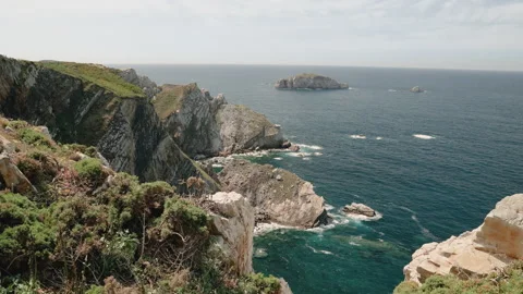 Scenic view of the rugged coastline and turquoise ocean from the cliffs Stock Footage 341508432