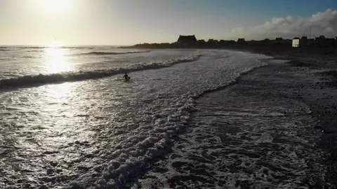 Scenic view of the sandy beach and ocean coast in Plozevet, Brittany, France Stock Footage 341882867