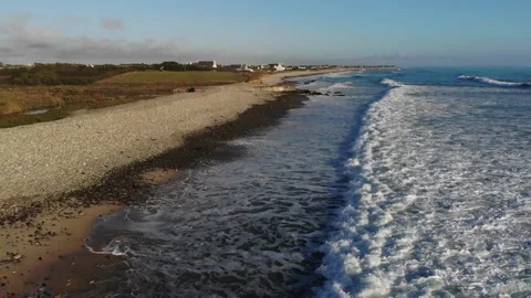 Scenic view of the sandy beach and ocean coast in Plozevet, Brittany, France Stock Footage 341882872