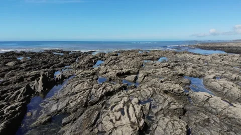 Scenic view of the sandy beach and ocean coast in Plozevet, Brittany, France Stock Footage 341882985