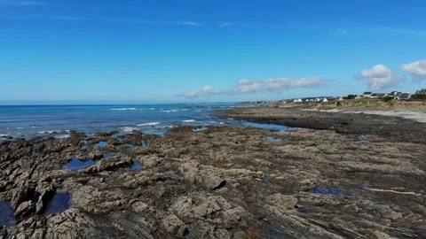 Scenic view of the sandy beach and ocean coast in Plozevet, Brittany, France Stock Footage 341882987