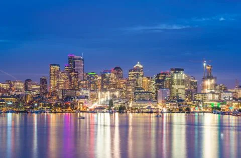 Scenic view of Seattle cityscape in the night time with reflection of the wat Stock Photos