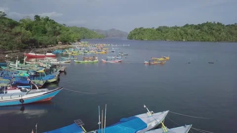 Scenic View of Sendang Biru Lagoon with Traditional Boats Video stock 341858546