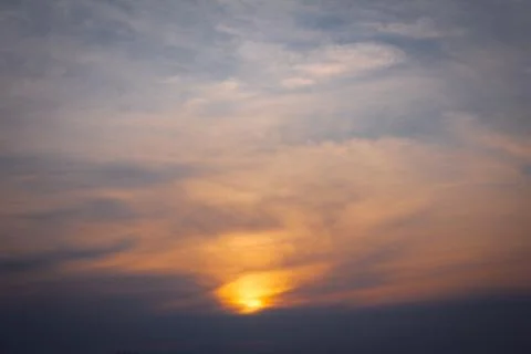 Scenic view of the sky with clouds during sunset in cityscape Stock Photos