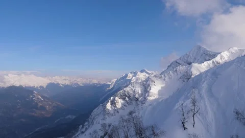Scenic view of snowy mountain range in winter Stock Footage 328536774
