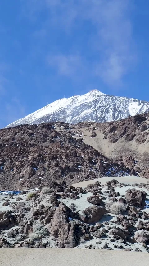 Scenic view of snowy teide volcano peak in tenerife Stock Footage 329865198