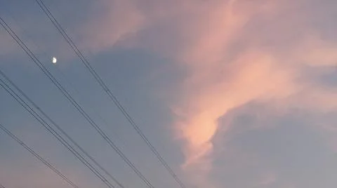 Scenic view of soft glowing clouds during a golden sunset or sunrise sky. 스톡 사진