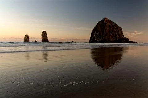 Scenic view of sunset at Haystack, Cannon Beach, Oregon, USA Stock Photos