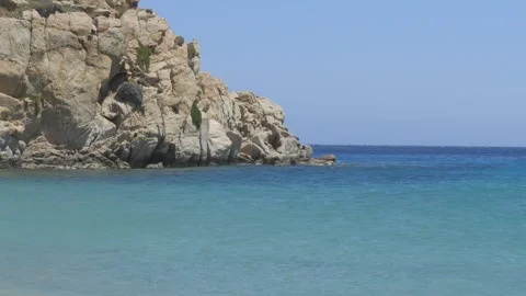 Scenic view of Super Paradise Beach in Mykonos, Greece. tilt up shot Stock-Footage 340385138