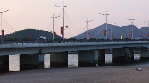 Scenic view of Tran Phu road bridge at sunset in Nha Trang, Vietnam Stock Footage 336565510