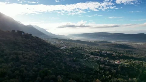 Scenic view: Valley, mountains, clouds sun in natural landscape Stock Footage 264080284