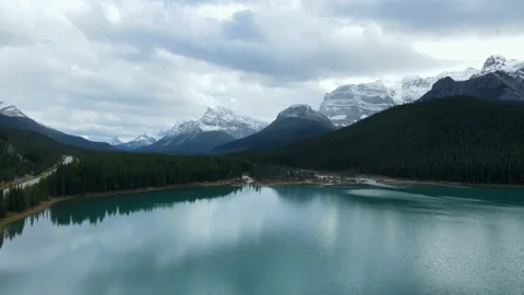 Scenic View of water in a mountain forest lake with pine trees Stock Footage 200664846