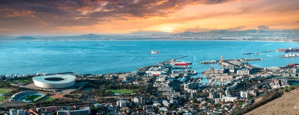 Scenic view of waterfront and Cape Town stadium  - enhanced dramatic sunset Stock Photos
