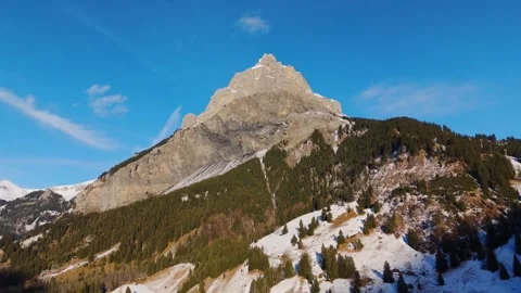 Scenic views of majestic mountain peak in winter sunlight Stock Footage 320293353