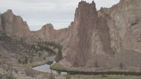 Scenic Vista of Smith Rock Cliffs and River Below Stock Footage 332363683