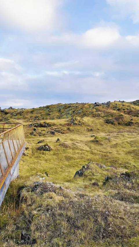 Scenic volcanic landscape with lava fields, green grasslands  in West and North 動画素材 320150548