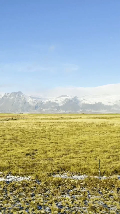 Scenic volcanic landscape with lava fields, green grasslands  in West and North 動画素材 320279450