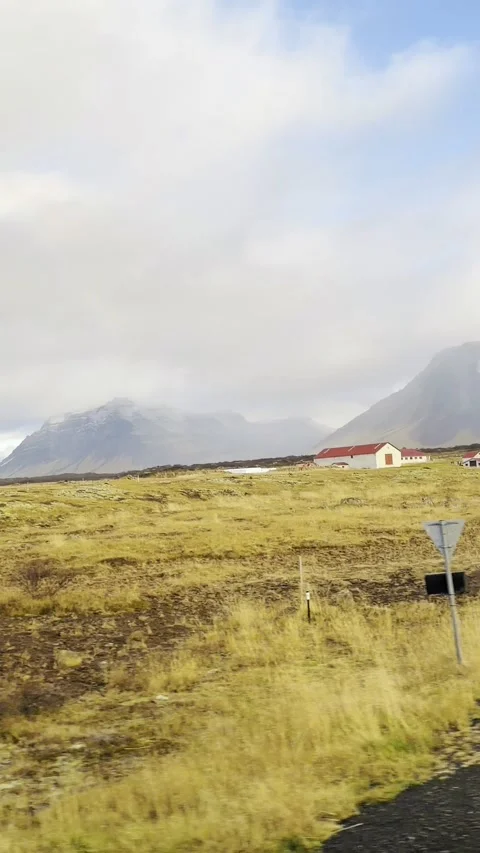 Scenic volcanic landscape with lava fields, green grasslands  in West and North 動画素材 320279479