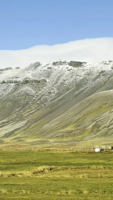 Scenic volcanic landscape with lava fields, green grasslands  in West and North 動画素材 320279481