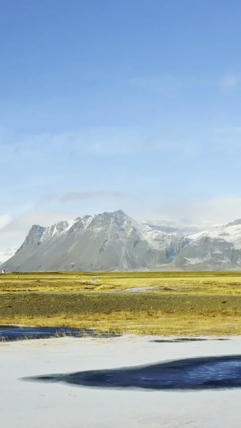 Scenic volcanic landscape with lava fields, green grasslands  in West and North 動画素材 320279512
